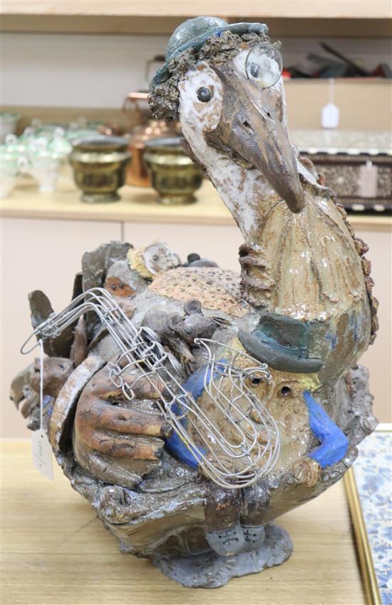 A Studio pottery model of a saxophone-playing pelican